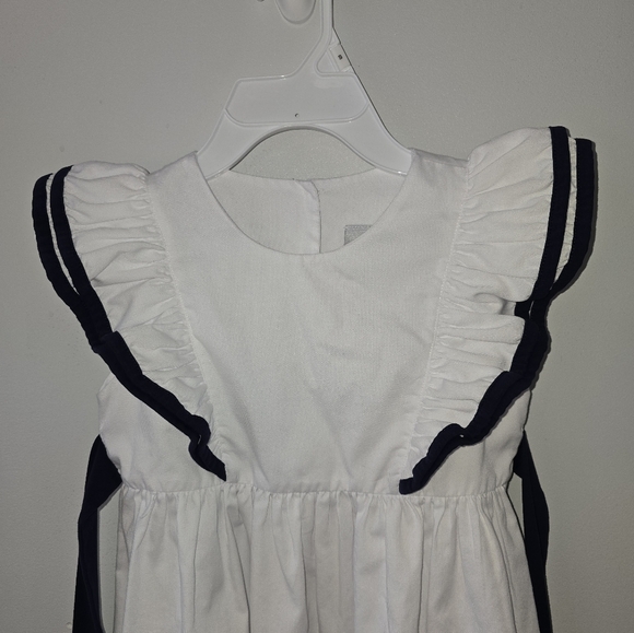 Delaney | 6 | Girls Flutter Sleeve white and navy dress - Picture 2 of 7